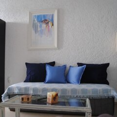 Апартаменты Andromachi Apartments комната для гостей фото 4