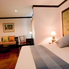 Отель Cucumber Inn Suites комната для гостей