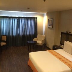 Отель Baguio Burnham Suites Филиппины, Багуйо - отзывы, цены и фото номеров - забронировать отель Baguio Burnham Suites онлайн комната для гостей фото 3