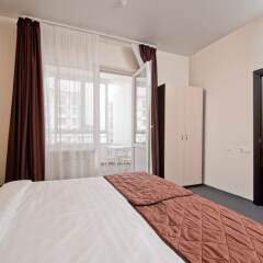 Апартаменты Olympic Apartments 65-67 комната для гостей