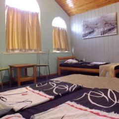 Гостиница Guest House on Solnechnaya 13 в Ольгинке отзывы, цены и фото номеров - забронировать гостиницу Guest House on Solnechnaya 13 онлайн Ольгинка комната для гостей фото 2