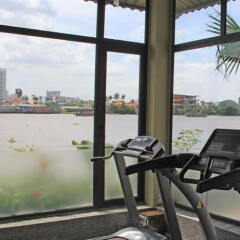 Отель The Waterfront Serviced Residence фитнесс-зал