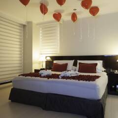Porton Medellin Hotel комната для гостей