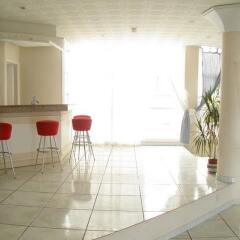 Отель Lawsonia Hotel Apartments Кипр, Протарас - отзывы, цены и фото номеров - забронировать отель Lawsonia Hotel Apartments онлайн интерьер отеля
