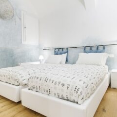 Отель GetTheKey San Vitale Apartment Италия, Болонья - отзывы, цены и фото номеров - забронировать отель GetTheKey San Vitale Apartment онлайн комната для гостей фото 4
