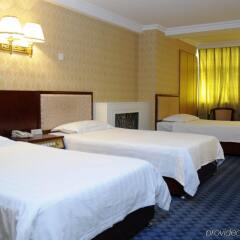 Wangfujing Da Wan Hotel комната для гостей фото 4