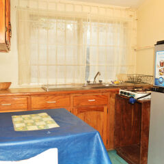 Отель Cottages Dead End Beach Road в номере