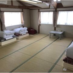 Minshuku Yakushima - Hostel Якусима комната для гостей