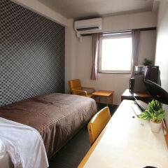 Hotel LiVEMAX Utsunomiya Уцуномия комната для гостей
