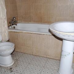Отель Emglo Suites ванная