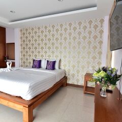 Апартаменты Kaewfathip Apartment Паттайя комната для гостей