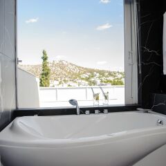 Отель Athenian Riviera Hotel & Suites Греция, Афины - отзывы, цены и фото номеров - забронировать отель Athenian Riviera Hotel & Suites онлайн ванная