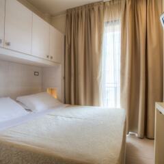 Отель Ferretti Beach Resort Римини комната для гостей фото 4