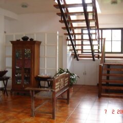 Отель Potter's Ridge Tagaytay Hotel Филиппины, Тагайтай - отзывы, цены и фото номеров - забронировать отель Potter's Ridge Tagaytay Hotel онлайн интерьер отеля фото 2