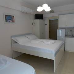 Апартаменты Ionian Beach Studio Саранда комната для гостей