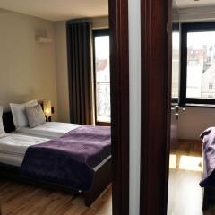 Отель SleepWalker Boutique Suites комната для гостей фото 5