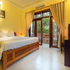 Отель Loc Phat Homestay Хойан комната для гостей