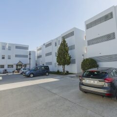 Отель Apartamentos Habitat парковка