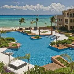 Encanto El Faro Luxury Ocean Front Condo Hotel Плая-дель-Кармен бассейн