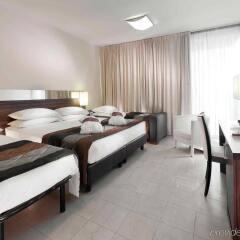 Отель Mercure Rimini Lungomare Италия, Римини - 8 отзывов об отеле, цены и фото номеров - забронировать отель Mercure Rimini Lungomare онлайн комната для гостей фото 2