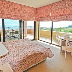 Отель Club Residence at BlackSeaRama Golf Болгария, Балчик - отзывы, цены и фото номеров - забронировать отель Club Residence at BlackSeaRama Golf онлайн комната для гостей