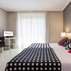Отель Apartamentos Sercotel Togumar