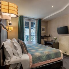 Отель Room Mate Alain сейф в номере