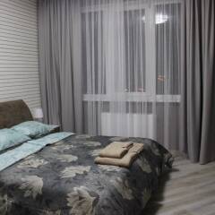 Апартаменты SKY-APARTMENTS комната для гостей фото 4