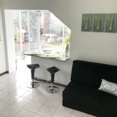Отель With 2 Bedrooms in Caloura, With Furnished Terrace and Wifi Португалия, Агуа-де-Пау - отзывы, цены и фото номеров - забронировать отель With 2 Bedrooms in Caloura, With Furnished Terrace and Wifi онлайн интерьер отеля фото 2