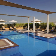Movenpick Hotel Apartments Al Mamzar Dubai бассейн фото 3