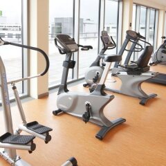 Отель Holiday Inn Berlin Airport - Conference Centre Шёнефельд фитнесс-зал фото 2