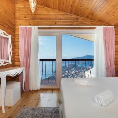 Villa Sardunya by Akdenizvillam Турция, Калкан - отзывы, цены и фото номеров - забронировать отель Villa Sardunya by Akdenizvillam онлайн комната для гостей