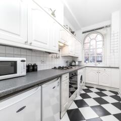 Апартаменты Spacious Apartment in Trendy Islington Лондон в номере