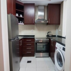 Отель One Perfect Stay - Discovery Gardens в номере фото 2