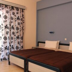 Отель Glyfada Gorgona Apartments Греция, Корфу - отзывы, цены и фото номеров - забронировать отель Glyfada Gorgona Apartments онлайн комната для гостей