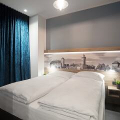 Отель dasPaul Aparthotel Германия, Нюрнберг - отзывы, цены и фото номеров - забронировать отель dasPaul Aparthotel онлайн комната для гостей фото 3