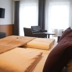 Отель Boutique Hotel Beckenlehner Германия, Унтерхахинг - отзывы, цены и фото номеров - забронировать отель Boutique Hotel Beckenlehner онлайн комната для гостей
