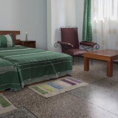 Отель SwissGha Homes Christian Retreat and Hospitality Center комната для гостей фото 5