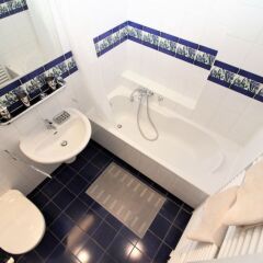 Апартаменты Manes Apartment ванная