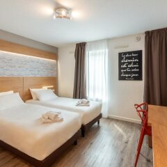 Отель Residhotel Lyon Part Dieu Франция, Лион - 2 отзыва об отеле, цены и фото номеров - забронировать отель Residhotel Lyon Part Dieu онлайн комната для гостей фото 2