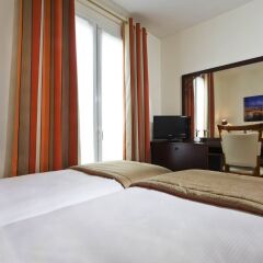 Grand Hotel Des Balcons Париж комната для гостей