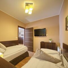 Апартаменты SKY Apartments VisitZakopane комната для гостей фото 4