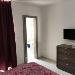 Апартаменты The Village Apartments удобства в номере