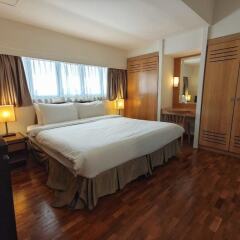 Отель Orchard Point Serviced Apartments Сингапур, Сингапур - отзывы, цены и фото номеров - забронировать отель Orchard Point Serviced Apartments онлайн комната для гостей фото 2