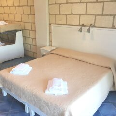 Отель CapoSperone Resort Италия, Пальми - отзывы, цены и фото номеров - забронировать отель CapoSperone Resort онлайн комната для гостей фото 2