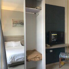 Sana Hotel Apartments Амман сейф в номере