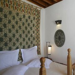 Отель Melenos Lindos Exclusive Suites and Villas сейф в номере