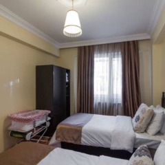 Апартаменты Istanbul Babil Apartments комната для гостей фото 4