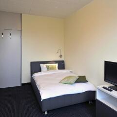 Отель Primestay Self Check-in Hotel Seebach Швейцария, Цюрих - отзывы, цены и фото номеров - забронировать отель Primestay Self Check-in Hotel Seebach онлайн комната для гостей фото 5