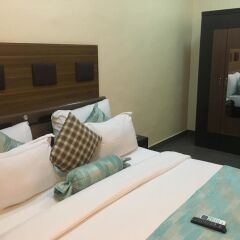 Отель Cynergy Suites Royale комната для гостей